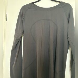Black long sleeve swiftly top